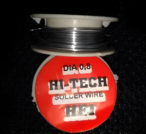 0.8mm 2.5ft Soldering Wire - shown as a spool of thin metallic wire wrapped around a white plastic reel with a red circular label reading HI-TECH.