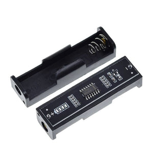1.5V Battery Tester For AA AAA High Precision Capacity Battery Detector With 4 Indicator Lights - two black plastic battery holders, one with a circuit board featuring an LM324 chip and four LED indicators.