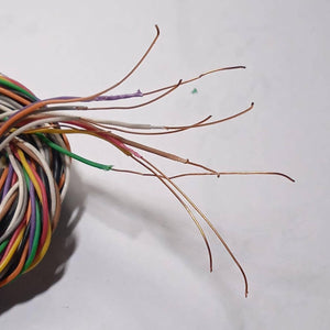 1 Meter 10pcs Hard Jumper Wires 100cm Spiral Wrap Wires 10 Core Cable - shown as a coiled bundle with several multi-coloured wires stripped to expose copper.