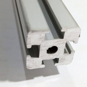 1 Meter 2020 Aluminum Profile Aluminium Extrusion For CNC And 3d Printer - a close-up view of the silver-colored metal extrusion showing its square cross-section with T-slots and a central circular hole.