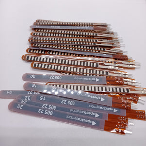 1 Piece 2.2 Inch Flex Sensor Bend Detection Sensor - a stack of multiple brown, rectangular flexible sensors with white printed text and connectors.
