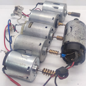 1 Piece Mix Shape DC Motor 3V To 24V Motor Without Wires - collection of five silver cylindrical DC motors with attached brass worm gears and various wire leads.