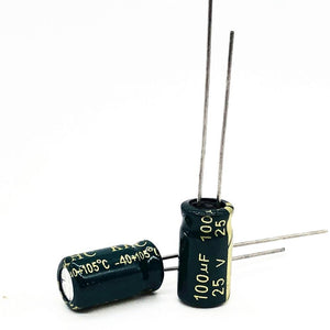 100uF 25V Electrolytic Polar Capacitor - shown as two dark green cylindrical components with two metal leads each, featuring printed temperature ratings.