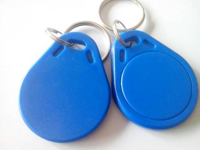 125kHz RFID Tag Key Ring Tag RFID Card - two blue, teardrop-shaped RFID proximity fobs with attached metal key rings on a white background.