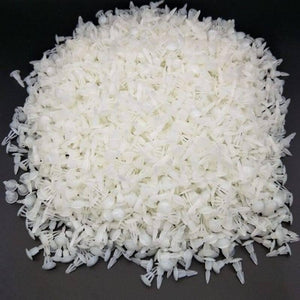 12mm Plastic PCB Circuit Board Spacer - shown as a large pile of small, white, translucent plastic fasteners against a black background.