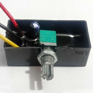 12V 5A DC Dimmer PWM - shown in a black rectangular housing with a green rotary knob, a capacitor, and red, black, and yellow wires.