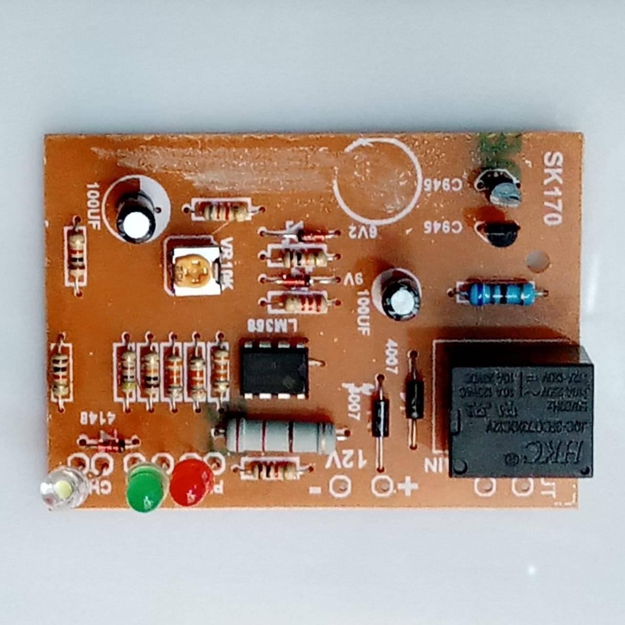 12V Battery Protection Auto Cut Off Circuit BMS - a rectangular brown circuit board with an LM358 chip, a relay, three LEDs, and a 10k potentiometer.