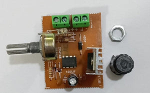 12V DC Motor Speed Controller Fan Speed Controller DC Fan Dimer - a brown circuit board with a potentiometer, two green screw terminals, a heatsink, and a separate nut and knob.