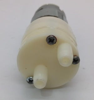 12V Water Cooler Pump stock lot - a close-up view of the white plastic pump head featuring two protruding nozzles and three Phillips head mounting screws.