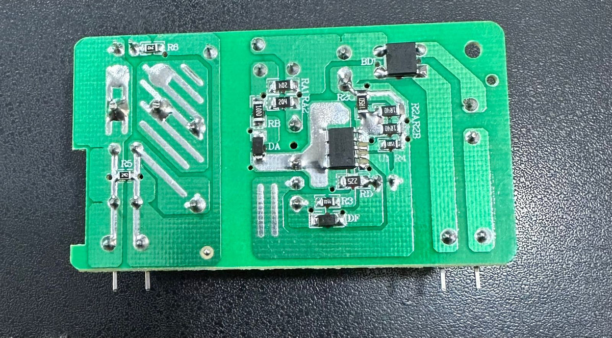 15V 2A Power Supply for Solar Inverters - a close-up of the green printed circuit board with various electronic components and soldering points.