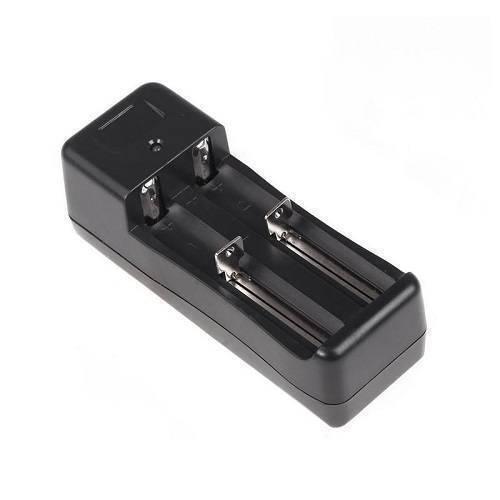 18650 Battery Charger Tg-008 - a black, rectangular, two-slot battery charger featuring metal spring-loaded contacts and a small circular indicator light.