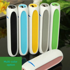 1pcs 2600mAh 5V 1A Mini Portable Power Bank - a cylindrical white body with colored side panels and a single USB port on the top.