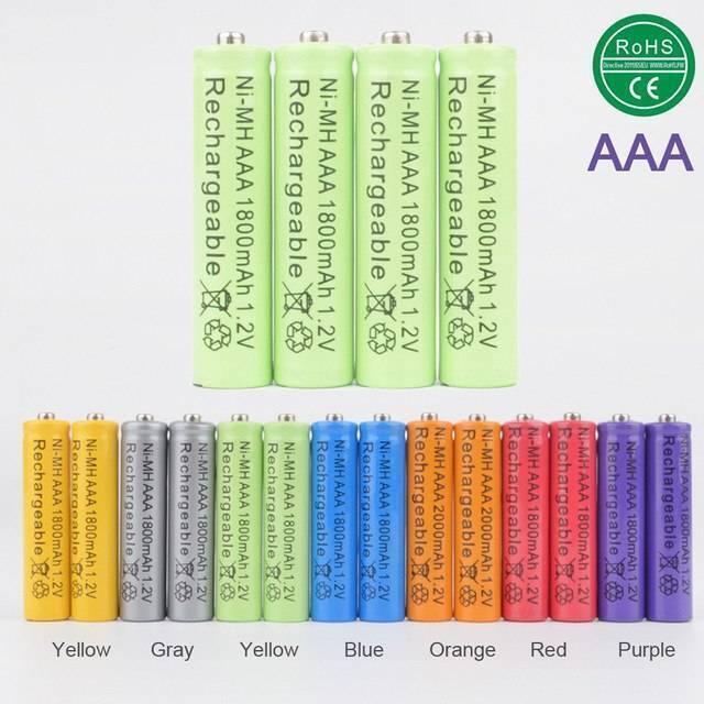 1pcs AAA Ni-MH 1.2 v Rechargeable Battery AAA 1000mAh Battery Rechargeable Batteries Ni-MH Battery - shown in a group of four green batteries above a row of fifteen multi-coloured batteries in various shades.