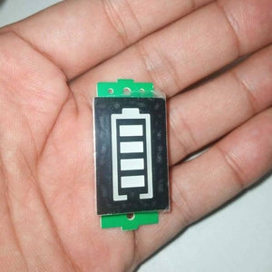 1s To 8s Adjustable Lithium Battery Fuel Gauge LED Display Battery Capacity Indicator Board Module - a close-up of a green rectangular circuit board featuring a four-bar battery icon.