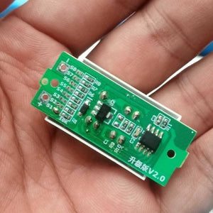 1s To 8s Adjustable Lithium Battery Fuel Gauge LED Display Battery Capacity Indicator Board Module - a close-up of the green rectangular circuit board held in a hand.