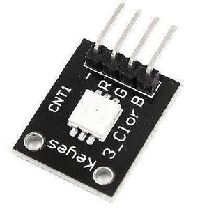 1watt RGB LED Module Ky 009 - a black rectangular circuit board with a central LED and four labeled pin connectors for -, R, G, and B.