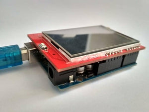 2.4 Inch TFT LCD Shield For Arduino ESP32 Solar Inverter - shown as a red display module plugged into a blue microcontroller board with a USB cable attached.