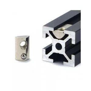 21mm x 13mm x 7mm M8 T Nut, Roll Ball Elastic Nuts For 4040 - shown as a silver metal nut next to a black aluminum extrusion profile with one nut inserted.
