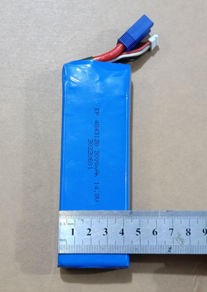 25S 4S 14.8V 2200mAh LiPo Battery - a blue rectangular battery pack with a blue XT60 connector and white balance plug, shown next to a metal ruler for scale.