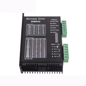 2DM542 Stepper Motor Driver - a black rectangular electronic module with two green terminal blocks, side-mounted DIP switches, and printed configuration tables.