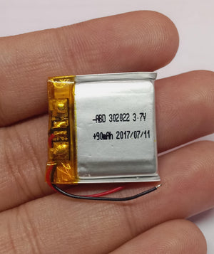 3.7V 90mAh Lithium Ion Li-ion Battery - a small silver rectangular cell with red and black wires and printed text including 302022.