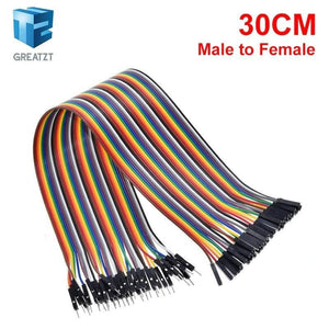 30cm Pin To Hole Arduino Jumper Wire Dupont - a multi-coloured ribbon of 30cm male-to-female jumper wires with black connector housings.