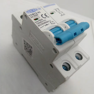 32A Tomzn Tob7z-63 2p DC 1000V Solar Circuit Breaker - Reliable Protection For Solar System - with two blue toggle switches, screw terminals, and printed technical specifications.