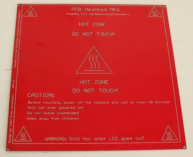 3d Printer PCB Heated Bed Mk2b 12V And 24V - shown as a square red PCB heatbed with "HOT ZONE" and "DO NOT TOUCH" warning text printed on the surface.