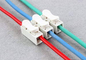 3pin Quick Connector Cable Clamp Terminal Block Spring Connector Wire 3pin - three white plastic spring-loaded connectors attached to colored wires.
