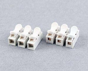 3pin Quick Connector Cable Clamp Terminal Block Spring Connector Wire 3pin - two white plastic three-port terminal blocks with spring-loaded levers.