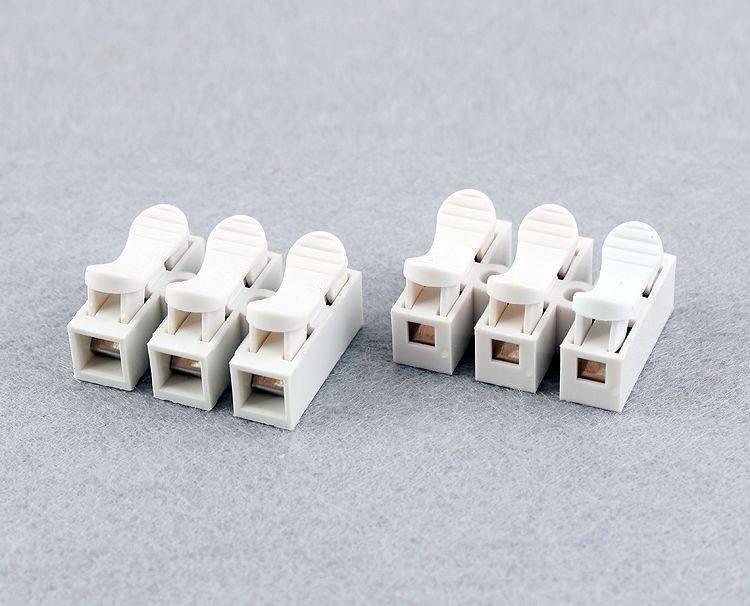 3pin Quick Connector Cable Clamp Terminal Block Spring Connector Wire 3pin - two white plastic three-port terminal blocks with spring-loaded levers.