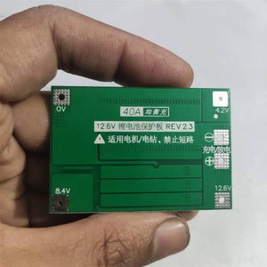 3s 40A BMS 11.1V 12.6V 18650 Lithium Battery Protection Board With 100mA Balancing Feature - shown as a green rectangular circuit board with labeled solder pads for 0V, 4.2V, 8.4V, 12.6V, and charging.