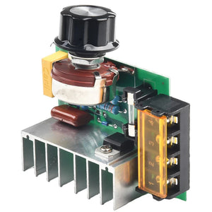 4000W AC SCR Voltage Regulator – 0-220V Motor Speed Controller With Temperature Protection - a black rotary knob, a green circuit board, a silver heatsink, a glass fuse, and a four-terminal connector block.