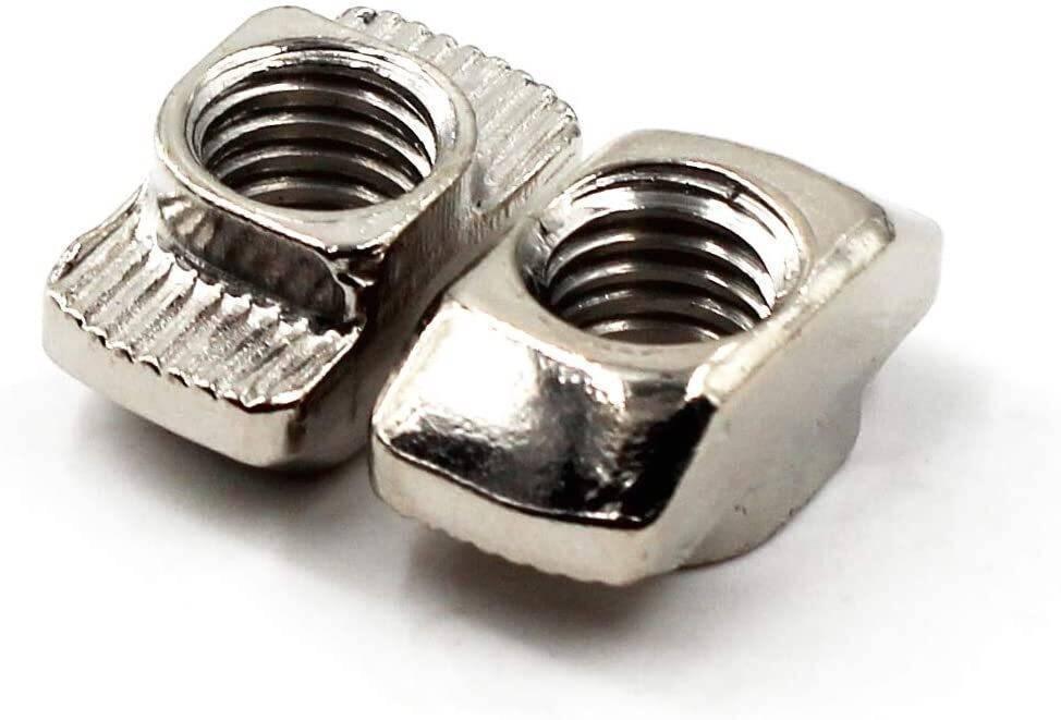 40XM4 T Nut Sliding T Nut Hammer Drop In Nut Fasten Connector M4 Series - a close-up of two silver-colored metal T-nuts with threaded holes.