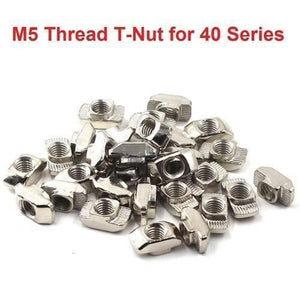 40XM5 T Slot Nut M5 Thread For 40 Series European Aluminium Profile Nickle Plated Hammer Head Type T Nut - a pile of silver, nickel-plated hammer head T-nuts with M5 threaded holes for 40 series aluminum profiles.