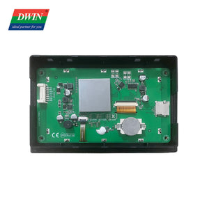 5 Inch With Enclosure HMI Display DMG80480C050 15WTR Commercial Grade - the green circuit board interior with a silver heatsink, a coin battery, and various ports.