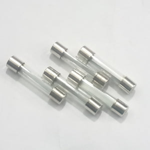 5 Pcs 6MMX21MM 35A Fuse - five cylindrical glass fuses with metal end caps arranged in a cluster against a plain white background.