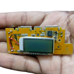 5V 2A DIY Power Bank Module With Display And Emergency Light Points - a yellow circuit board with a blank LCD screen, USB ports, and wires.