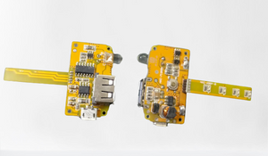 5V 2A Power Bank Module - shown from both sides, featuring a yellow PCB, a USB-A port, a micro-USB port, a push button, and an attached LED strip.