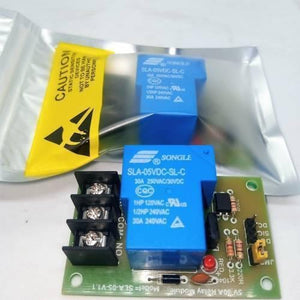 5V 30A Relay Module SLA-05VDC-SL-C - a green PCB with a blue relay, screw terminals, a red LED, and a second unit inside an anti-static bag.