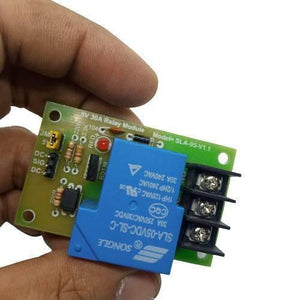 5V 30A Relay Module SLA-05VDC-SL-C - a green circuit board with a blue relay, a red LED, and a three-terminal screw connector.