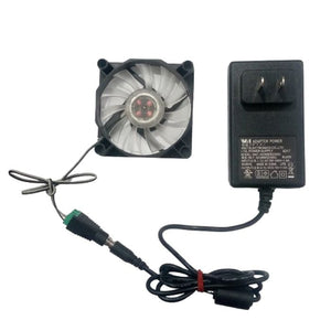 5V LED Fan With Power Supply And Female DC Plug Kit - a black cooling fan with white blades connected via a DC jack to a black wall power adapter.