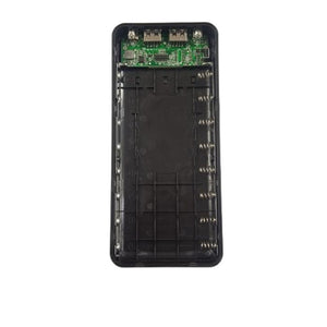 8 Cells Dual USB Power Bank Case With LCD Display - shown as an open black plastic housing with a green circuit board and two USB ports at the top.