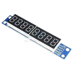 8 Digit 7 Segment Module Assembled MAX7219 - a blue rectangular circuit board featuring an eight-digit display and five labeled pins: VCC, GND, DIN, CS, CLK.