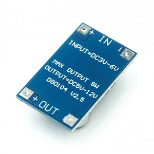 8W USB Input DC-DC 3V-6V To 12V 3A Converter Step-up Module | Digilog.pk - a small blue rectangular circuit board with labeled input and output solder pads.