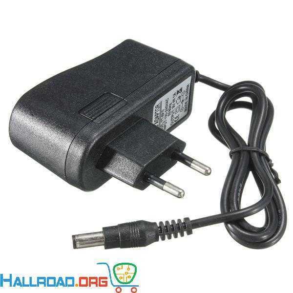 9V 1amp Power Adapter For Arduino Power Supply - a black wall-plug power adapter with a two-pin plug and a DC barrel jack connector.