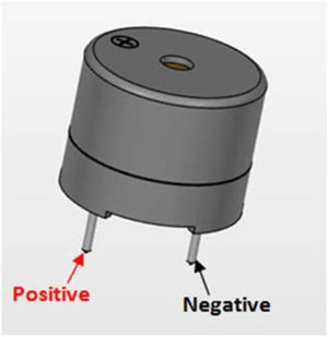 Active Piezo Buzzer 3V To 12V Active Buzzer for Arduino - a grey cylindrical component with two pins labeled as positive and negative.