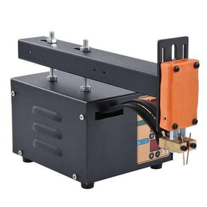 Adjustable Digital Display Point Welding Machine Jsd Iis Small Battery Pack Lithium Battery Welder - a black metal device with an orange handle, welding tips, and a digital control panel.