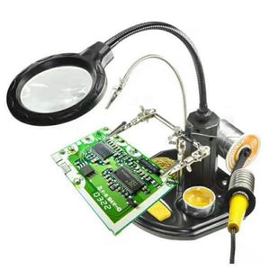 Advanced 2.5x-4x 16 SMD LEDS Desk Lamp Iron Soldering Base Magnifier Glass Helping Hand Station Stand - holding a green circuit board with metal clips.
