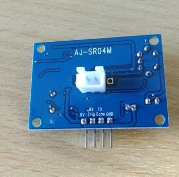 AJ-SR04M V3.0 Waterproof Ultrasonic Distance Sensor - the blue rectangular circuit board with a white two-pin connector and four output pins.